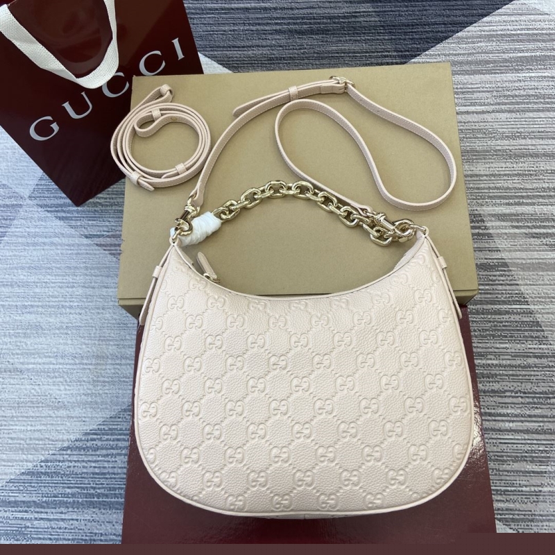 G*u*i top handle bags